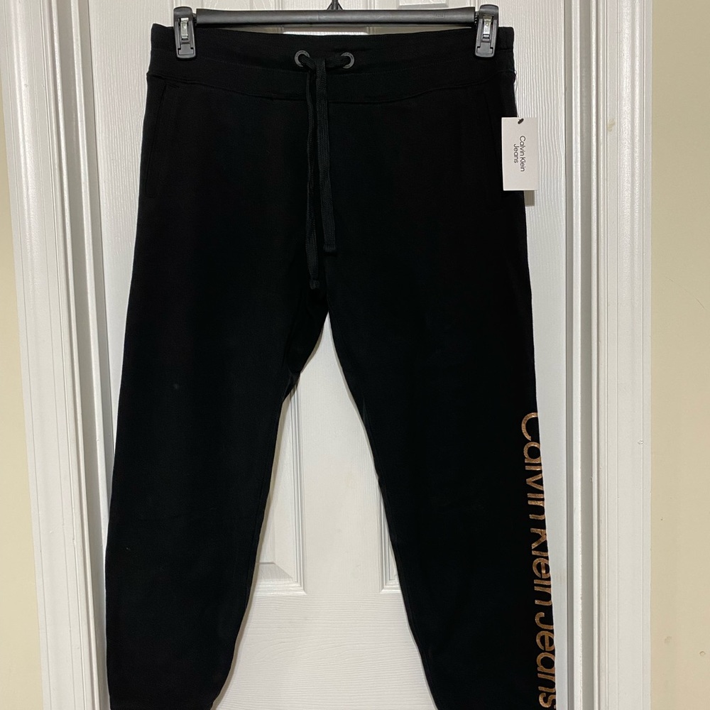 Calvin Klein Jeans Women’s sweat pant.Size L. Color black
